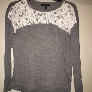 A gray lace long sleeve shirt
